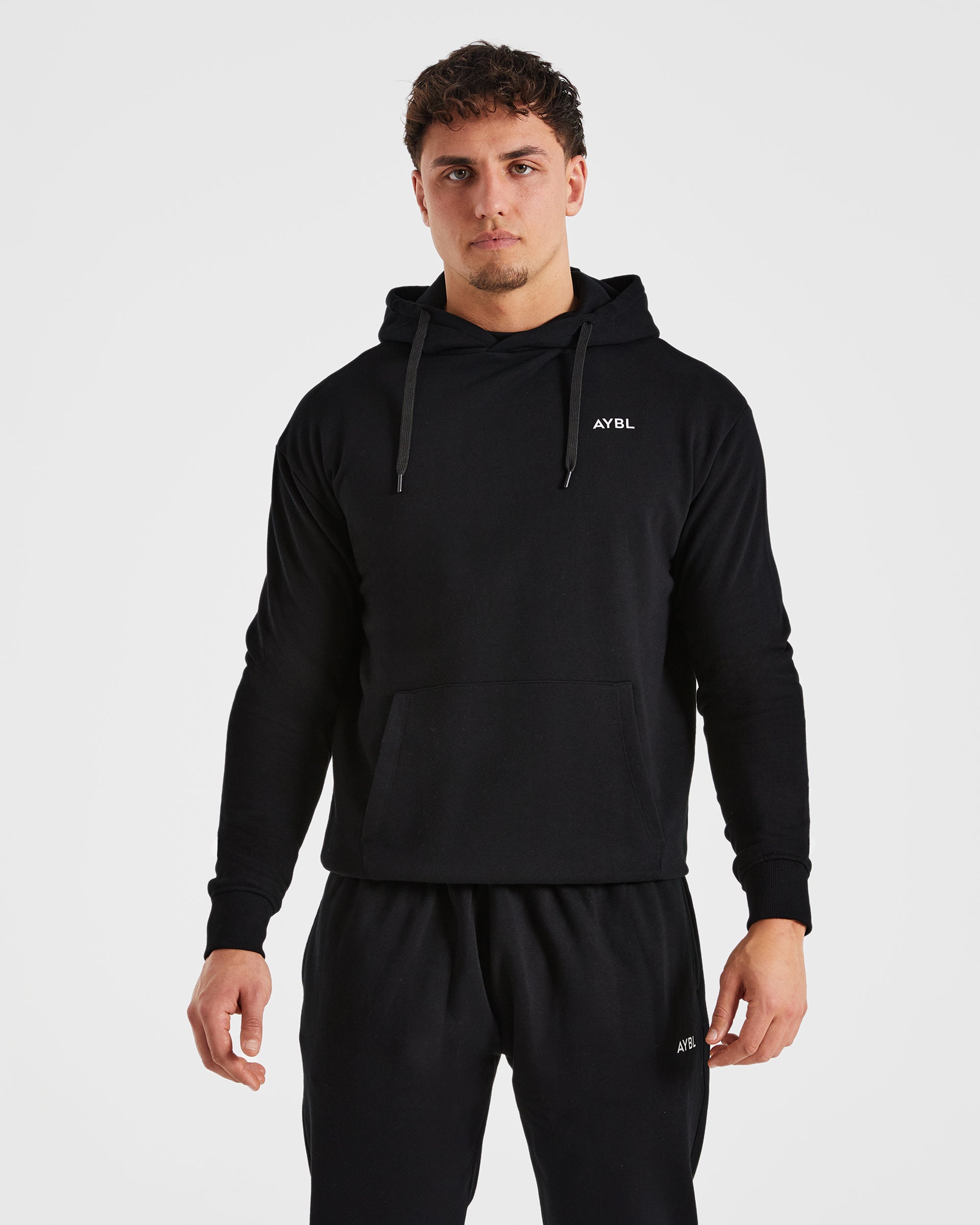 Essential Kapuzenpullover – Schwarz