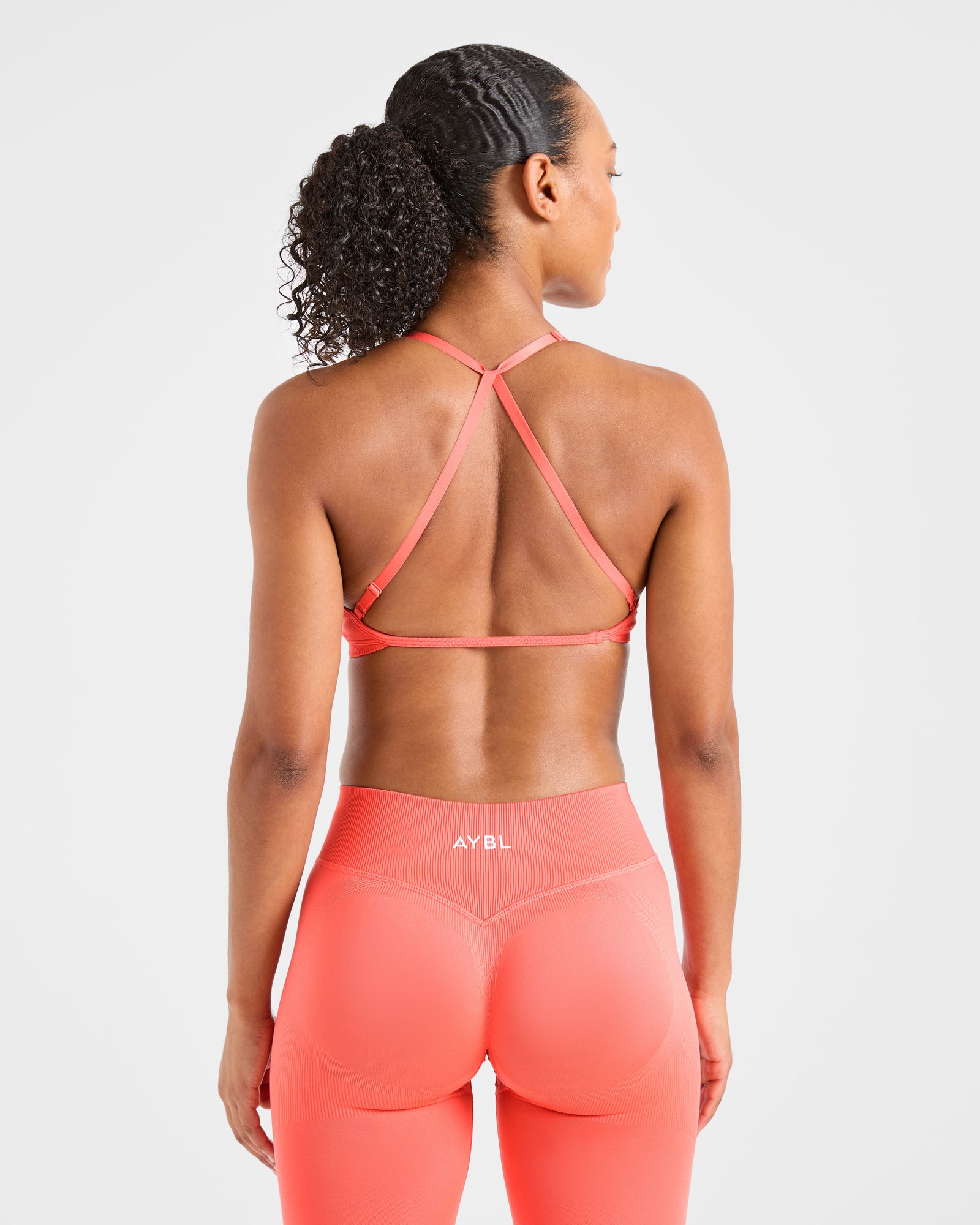 Adapt Seamless Strappy Sports Bra - Summer Peach