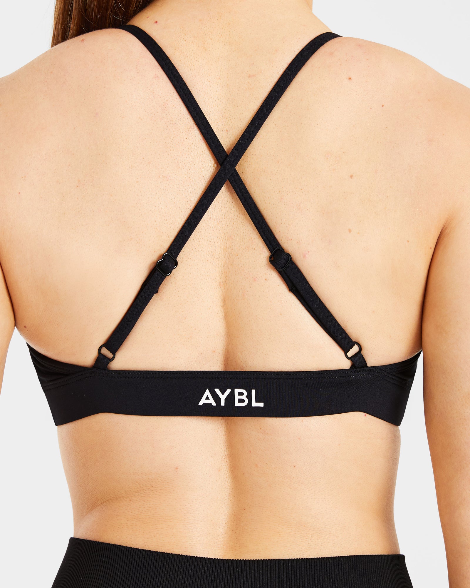 Essential Twist Crossback Sports Bra - Black