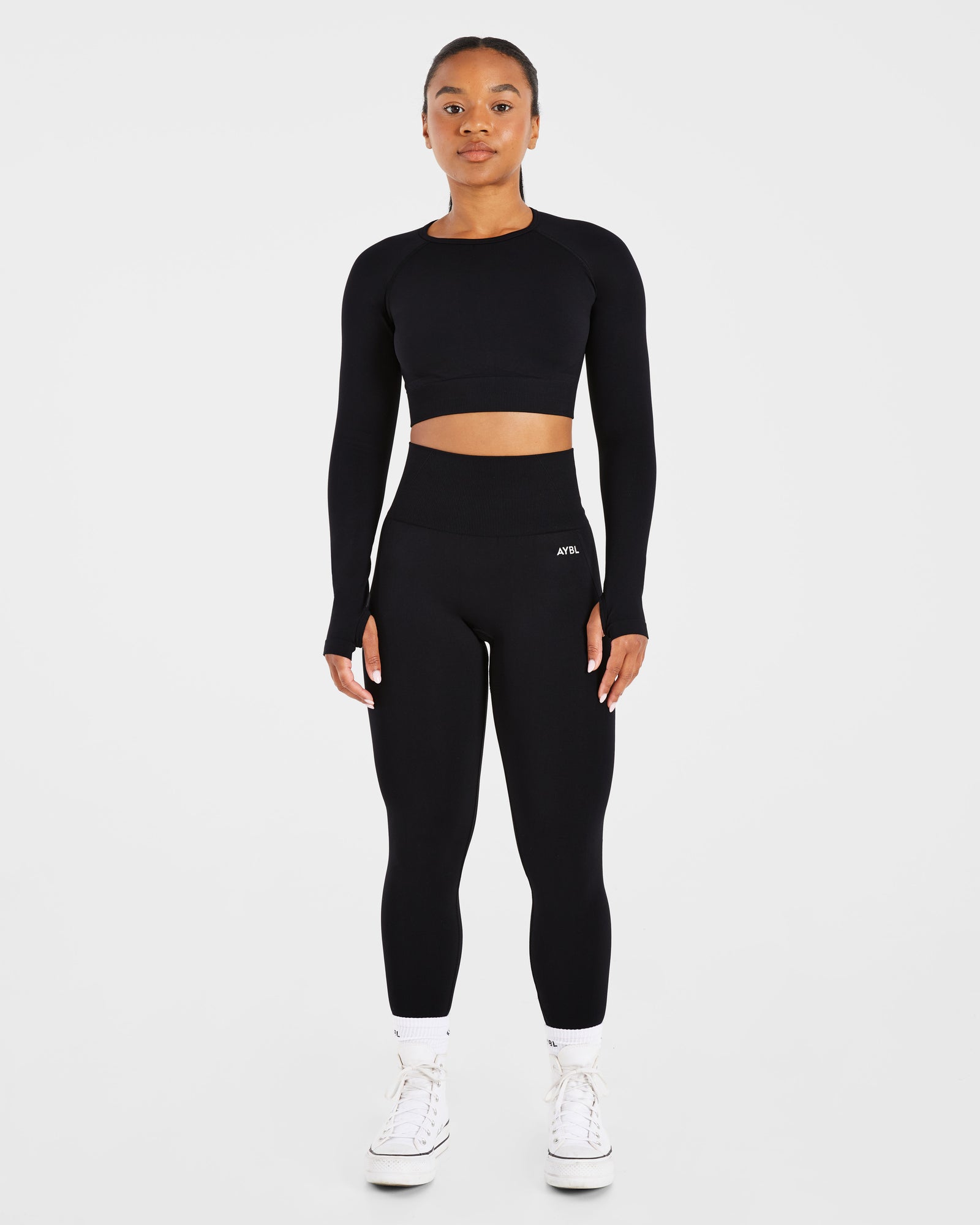 Haut court à manches longues sans couture Empower - Noir