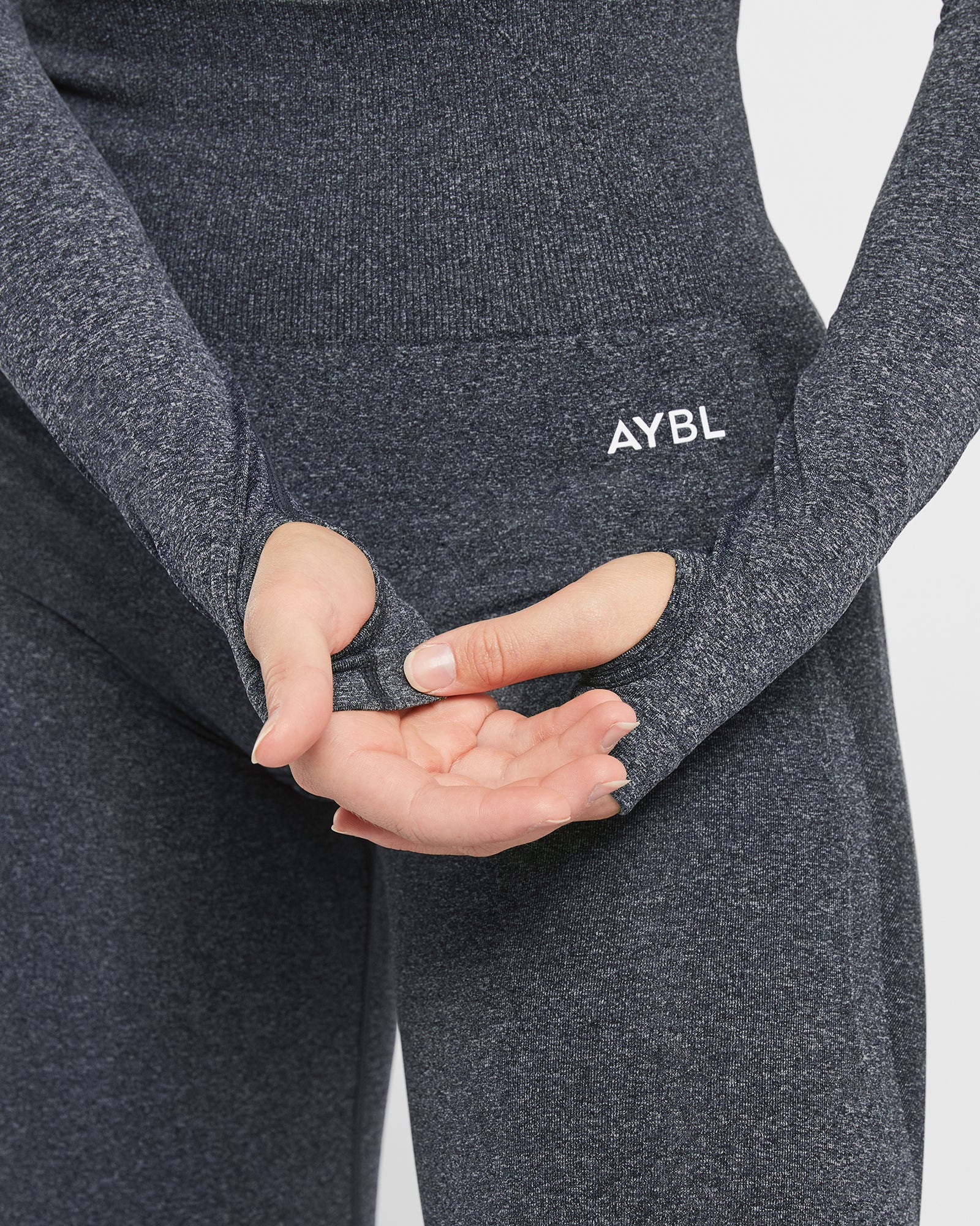 Empower Nahtloses Langarm-Crop-Top – Schwarz meliert